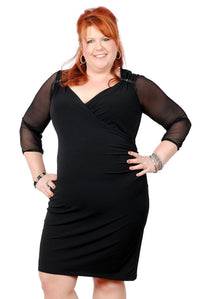 Covers your arms stylishly, without covering up the cute buckle details in this sleeveless Michael Kors dress. (Low-cut side in front)