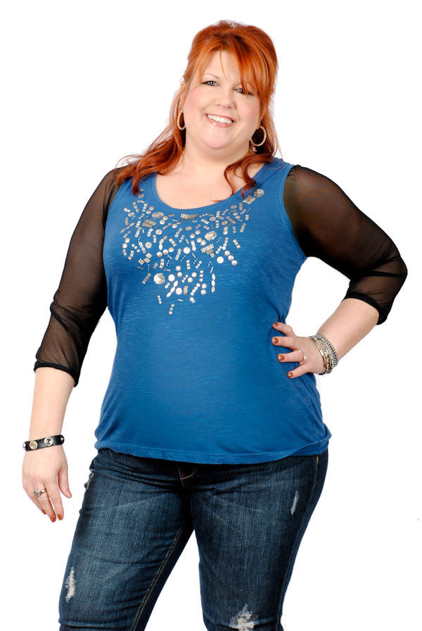 Creates a new outfit wearing  black mesh Sleevey Wonders under her sleeveless,  beaded blue tank top. (High side in front)